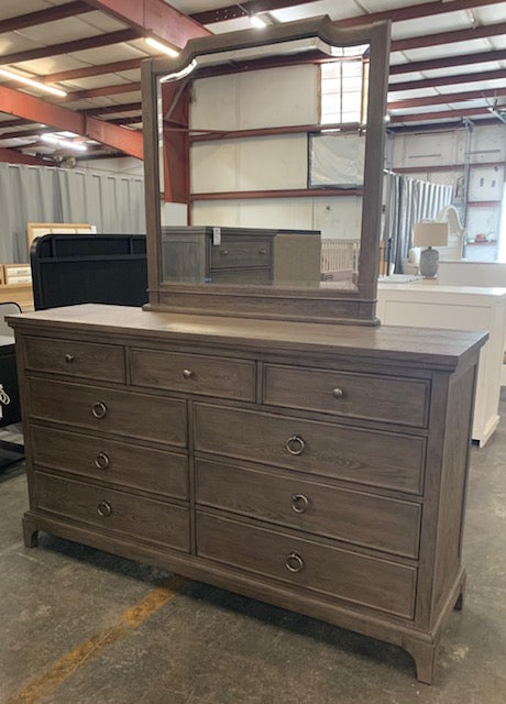 Brown Dresser with Bronze Pulls and Mirror