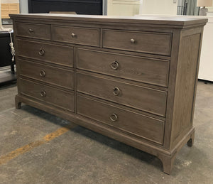 Brown Dresser with Bronze Pulls and Mirror